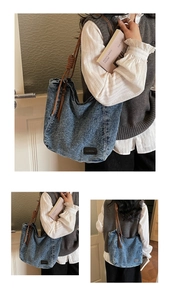 Detail view of large denim tote bag with brown rope handles and brand leather patch