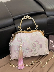 Floral embroidery silk frame handbag with gold metal clasp and beaded handle strap