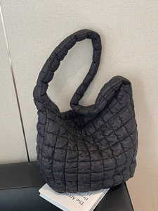 Quilted black puffer hobo bag for women with large capacity and fluffy padded texture