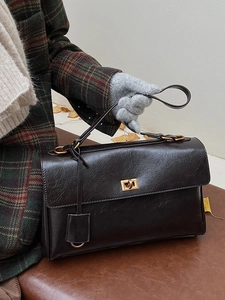 Vintage dark brown leather Kelly bag for women with gold clasp and autumn theme