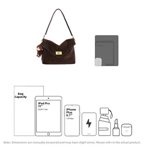 Brown vintage shoulder bag detail showing capacity for 11 inch iPad Pro and daily items
