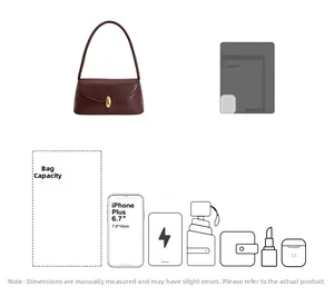Detail view of burgundy leather bag interior capacity showing phone and daily essentials