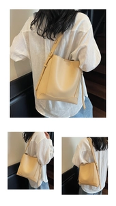 Detailed views of a beige bucket shoulder bag featuring soft textured leather and wide strap