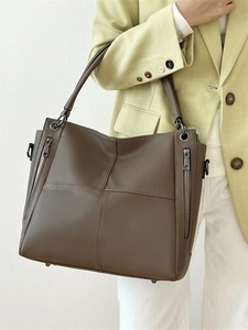 Large brown lychee texture leather tote bag with side zipper and crossbody shoulder strap