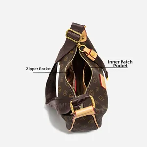 Interior view of monogram hobo bag showing zipper pocket and spacious inner lining