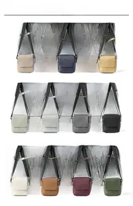 Grid display of cross-body bags in 11 colors with adjustable straps and Hey Mister logo
