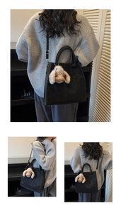 Lifestyle view of a black matte leather tote bag featuring a cute plush bunny charm