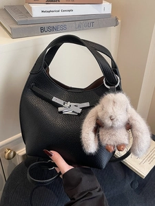 Retro black litchi pattern bucket bag with rabbit charm and adjustable shoulder strap