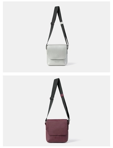 Detail of lychee pattern leather texture and metal buckles on minimalist crossbody bags