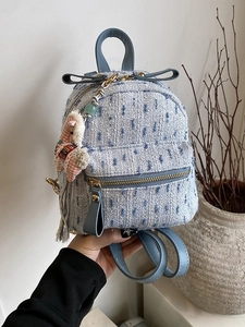 Mini light blue tweed backpack with wool pendant and leather straps for women