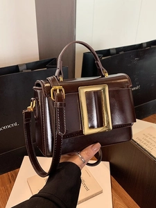 Retro dark brown leather square handbag with large gold buckle and adjustable strap