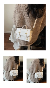 Detail of white square bag with golden buckles and adjustable shoulder strap style