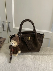 Retro dark brown crossbody handbag with plush bear charm and vintage gold buckle hardware