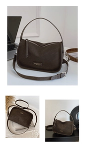 Detail view of a coffee brown crossbody bag showing textured leather and brand logo tag