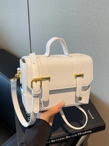White minimalist retro crossbody box bag with gold metal buckle and top handle for women