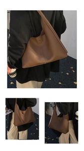 Detail der dunkelbraunen Hobo-Tasche aus Narbenleder mit Nähten und Logoprägung