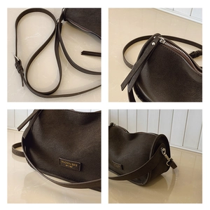 Detailed views of dark brown lychee leather handbag showing silver zipper and brand logo