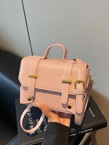 Pink minimalist PU leather crossbody bag with top handle and gold buckles for women