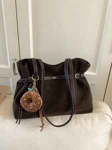 Minimalist dark coffee suede tote bag with brown leather straps and star donut charm