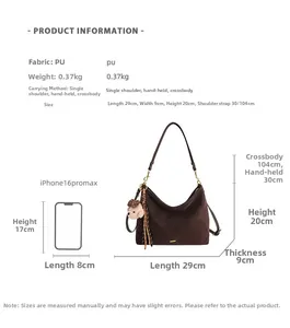 Brown retro shoulder bag dimensions and size comparison with smartphone shown in detail