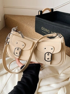 Beige faux leather underarm bag with multi-pockets and silver chain shoulder strap