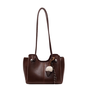 Large capacity dark brown vintage leather tote bag with stylish plush pendant and silver rivets