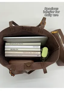 Top view of large tote bag showing spacious interior with books and organizer pouch
