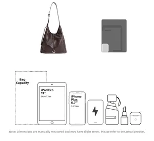 Détail intérieur du grand sac cabas marron montrant l'espace pour iPad 11 pouces et mobile