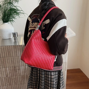 Large red woven bucket bag for women with chic intrecciato pattern shoulder strap
