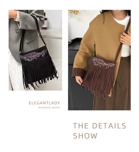 Detail showing elegant suede crossbody bag with feather embroidery and long tassels