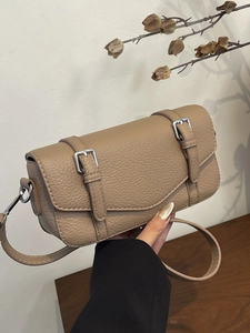 Khaki pebbled leather messenger bag with flap closure and dual silver buckles decoration