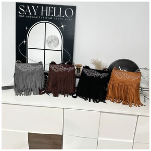Detailed display of four fringe crossbody bags in gray, brown, black, and caramel colors