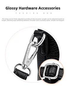 Detailed macro view of shiny silver hardware and lychee grain leather on black tote bag