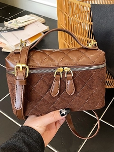 Brown quilted crossbody camera bag in smooth leather and suede patchwork with gold hardware