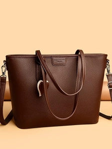 Large dark brown leather tote bag with lychee texture and heart charm for women