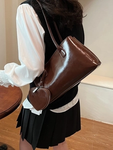 Glossy chocolate brown shoulder tote bag with heart-shaped coin purse accessory for women