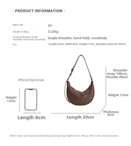 Detailed size specifications for the brown leather crescent bag with dimensions in cm