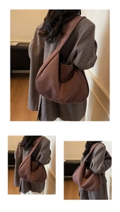 Macro detail of the brown matte suede texture and Hobo design on this large shoulder bag