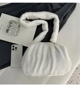 Detailed top view of white plush cloud bag showing actual capacity and soft ruffled texture
