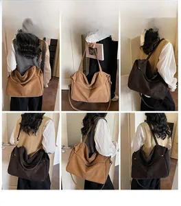 Detailed multi-angle view of a large vintage suede tote bag worn by a model