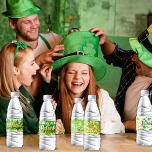 Close-up of St. Patrick's Day water bottle labels with lucky shamrock designs for party decor