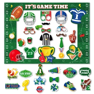 Football party photo booth props with It's Game Time frame and athletic accessories