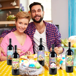 Close-up of Easter wine bottle stickers featuring colorful rabbits and spring flower motifs