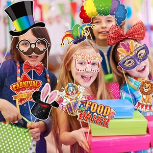 Kids using colorful carnival photo booth props including clown masks and circus hats