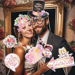 Wedding photo booth props set with floral designs for bride and groom party fun