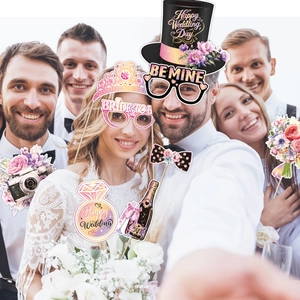 Wedding photo booth props kit with Happy Wedding Day floral hats and bride heart glasses