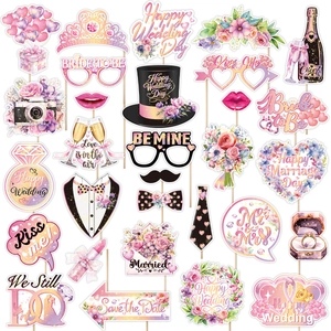 Wedding party photo booth props kit with floral bride and groom signs on sticks