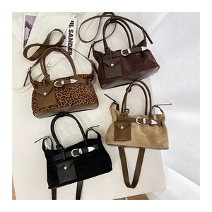 Suede tote bags in four colors featuring detachable mini pouches and shoulder straps