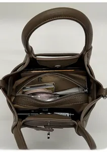 Top view of lychee pattern leather bucket bag showing spacious internal compartments and zip pocket