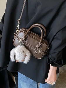 Dark brown faux leather Boston handbag with cute rabbit plush charm and crossbody strap
